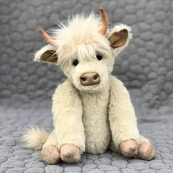Charming Highland cow plush with a vibrant flower crown. Soft collectible stuffed animal, perfect unique gift.