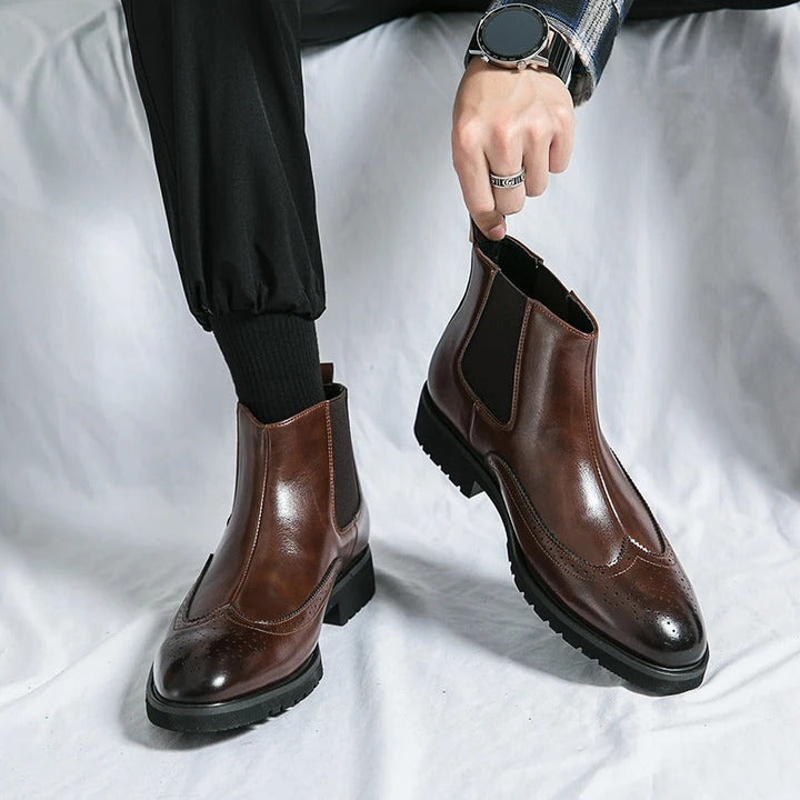 Versatile men's chelsea boots, brogue pattern makes them suitable for both office and casual outings.