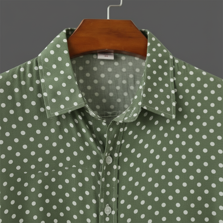 Effortless men's resort wear: short sleeve polka dot cabana shirt with a relaxed fit.