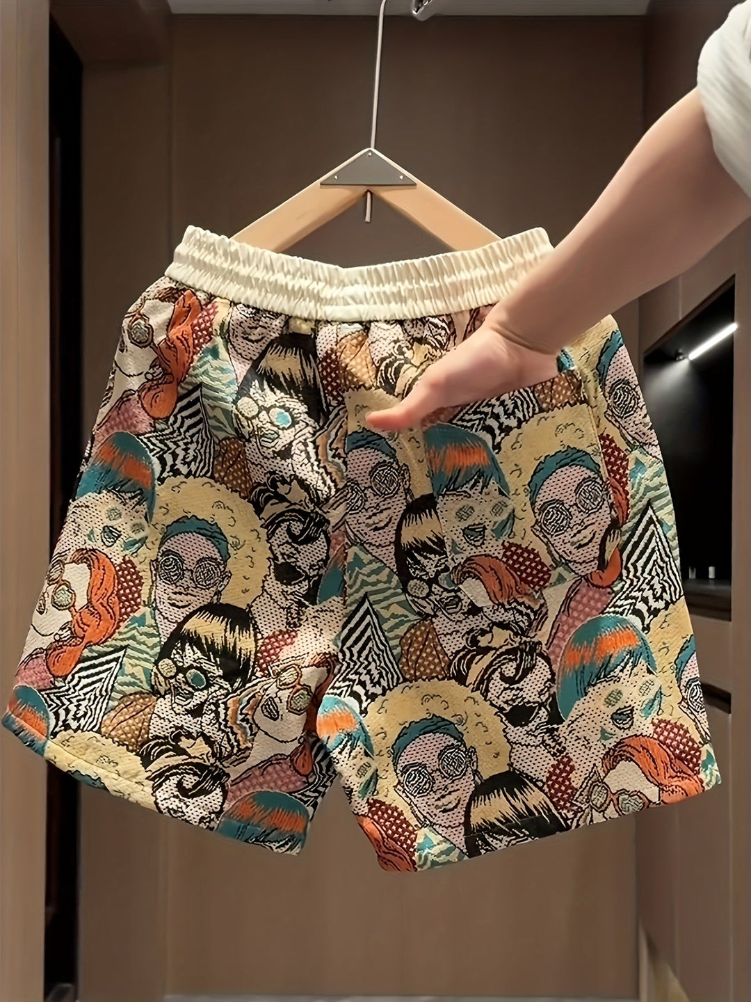 Vibrant pop art graphic print unisex shorts, perfect for retro streetwear and comfortable lounge wear. Unique design.
