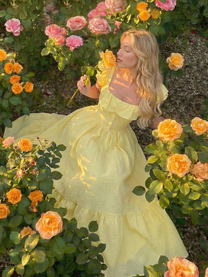 Flowy ruffled off-shoulder maxi dress for women, ideal for beach vacations & elegant evening wear.