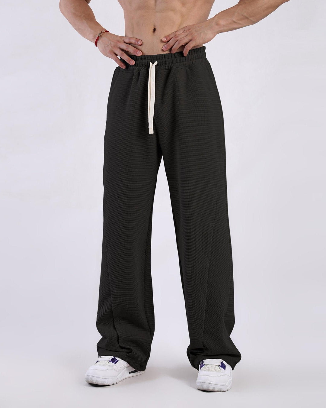 Stylish men's Lucca relaxed fit waffle texture sweatpants, versatile for casual fashion & comfy wear.