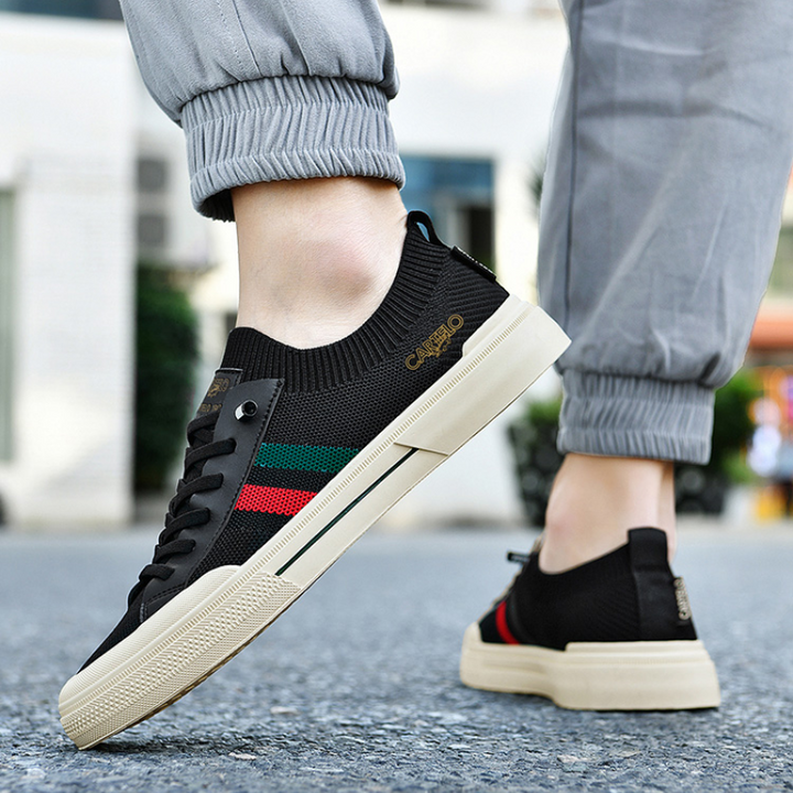 Pair of men's lightweight everyday sneakers, designed for ultimate comfort and versatile casual style.