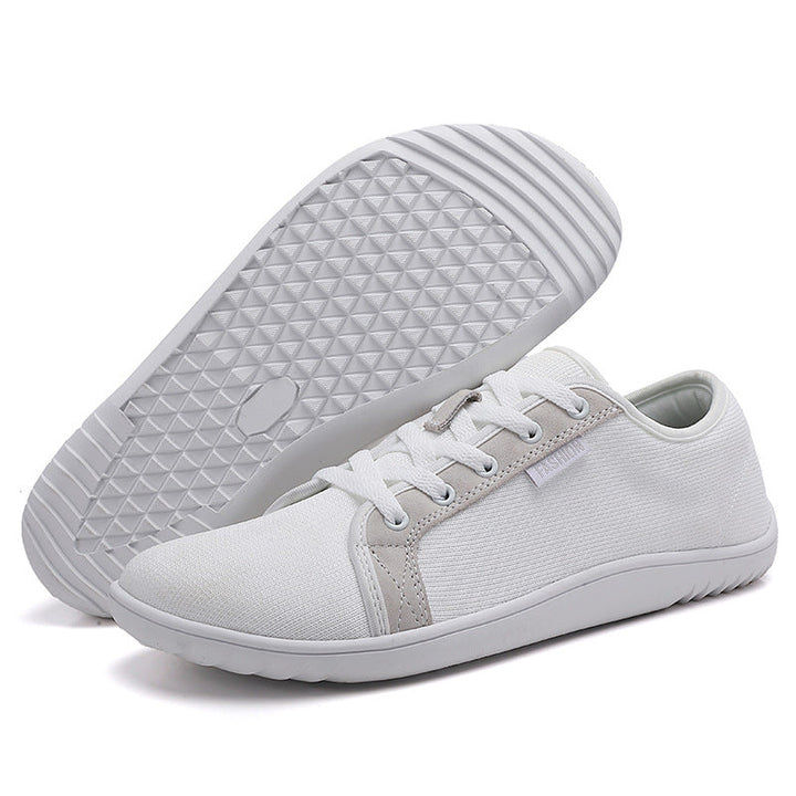 Comfortable zero-drop wide-fit shoes designed for natural walking. Unisex, supportive, and perfect for everyday foot health.