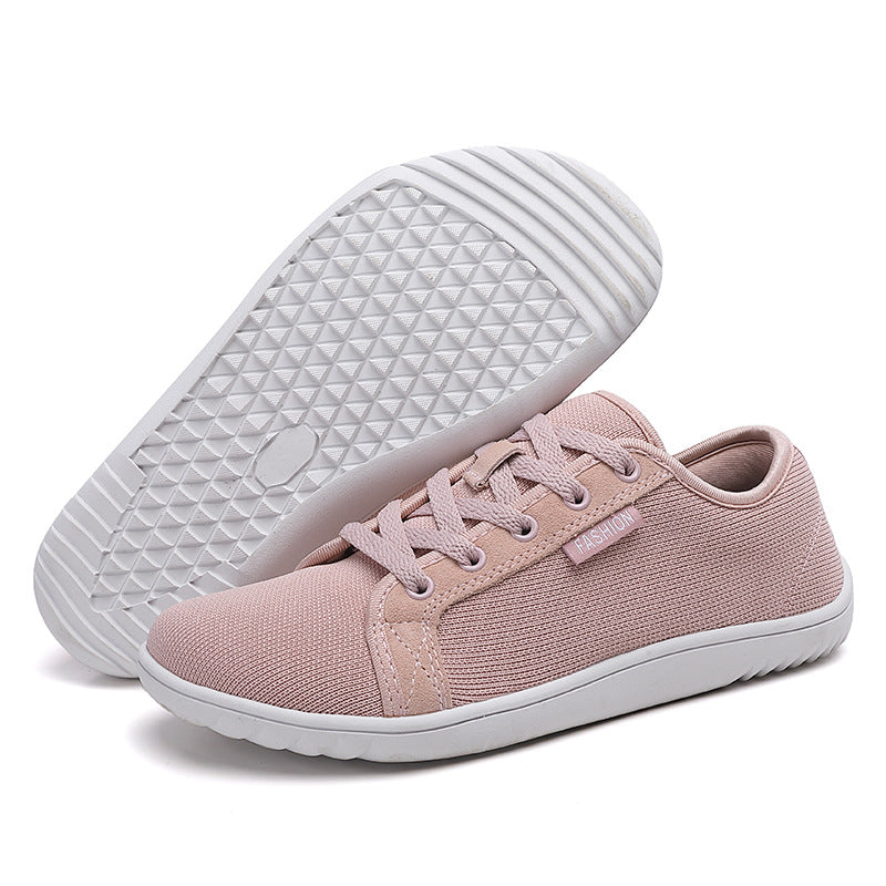 Supportive zero-drop walking shoes with a wide fit. Unisex comfort footwear promoting natural gait & foot health.