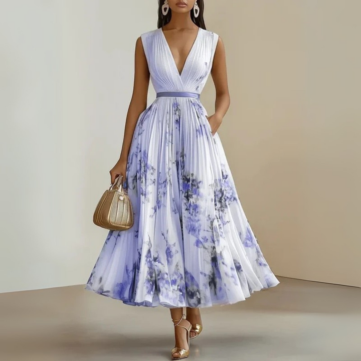 Sophisticated women's maxi dress with a V-neck, pleated skirt, cinched waist, and pockets for an elegant look.