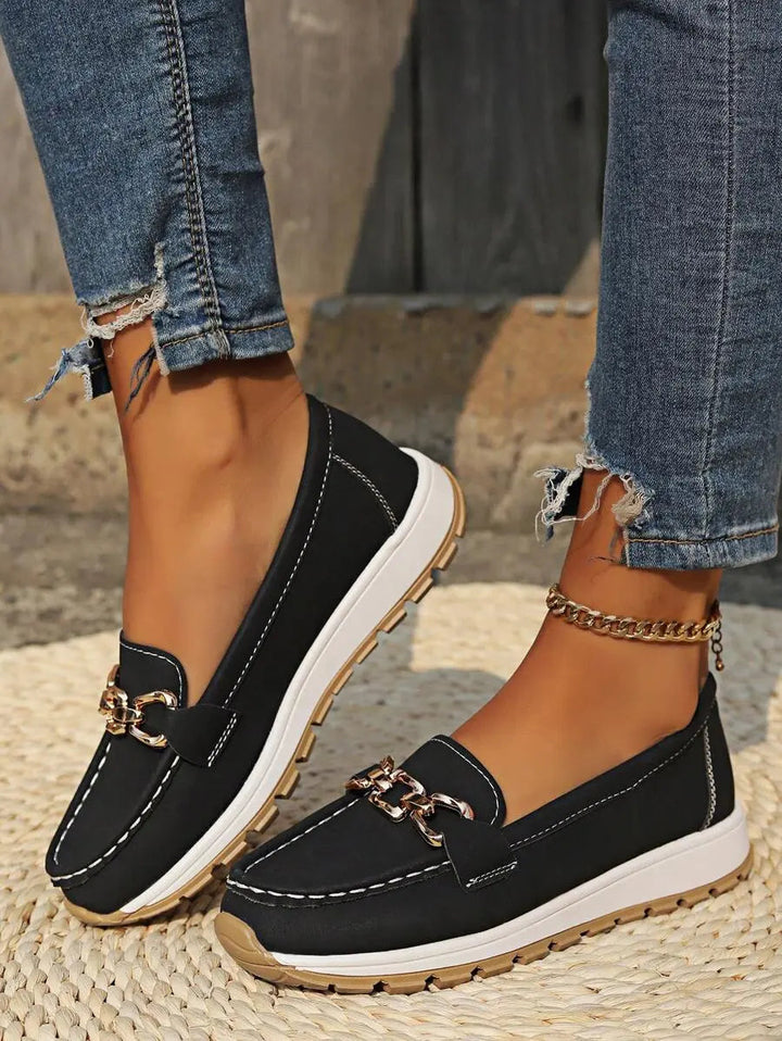 Woman wearing casual non-slip orthopedic loafers, perfect for comfortable everyday style.
