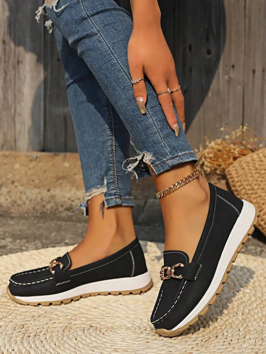 Close-up of non-slip outsole on women's orthopedic walking loafers for secure grip.