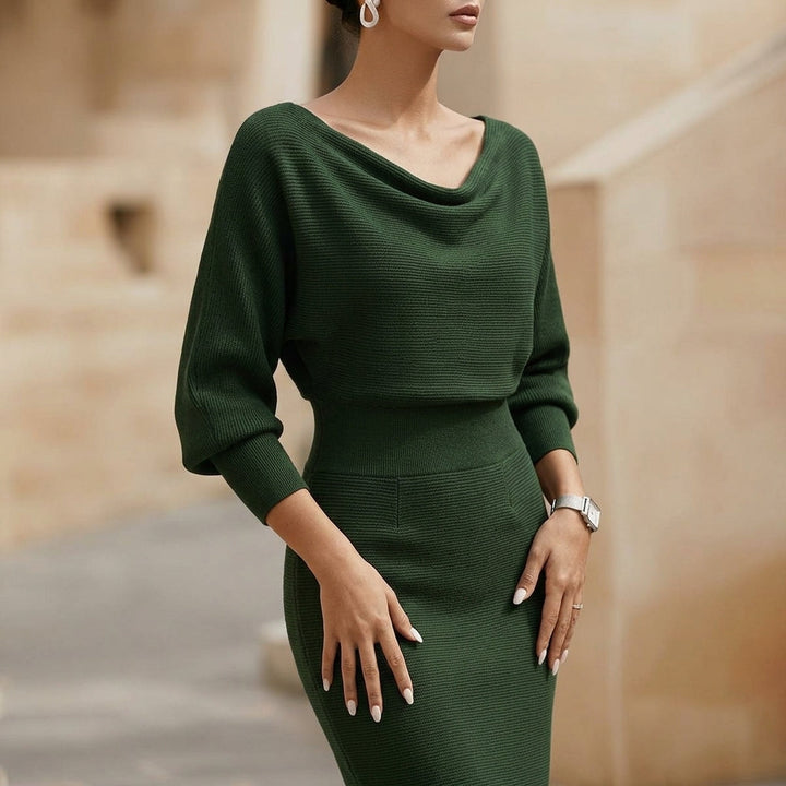 Flowy green midi dress for women, elegant design with adjustable spaghetti straps. Ideal sleeveless occasion wear.