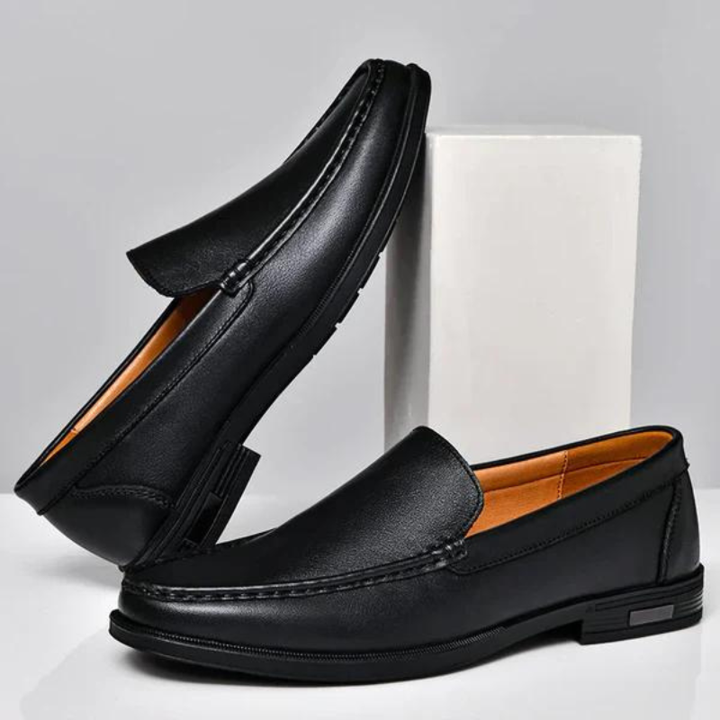 Classic men's slip-on loafers, comfortable and stylish for office, casual, or formal wear.