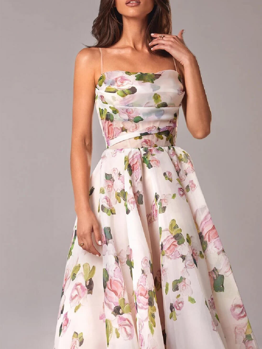 Sleeveless women's elegant boho midi dress, a-line flowy summer style with slender spaghetti straps.