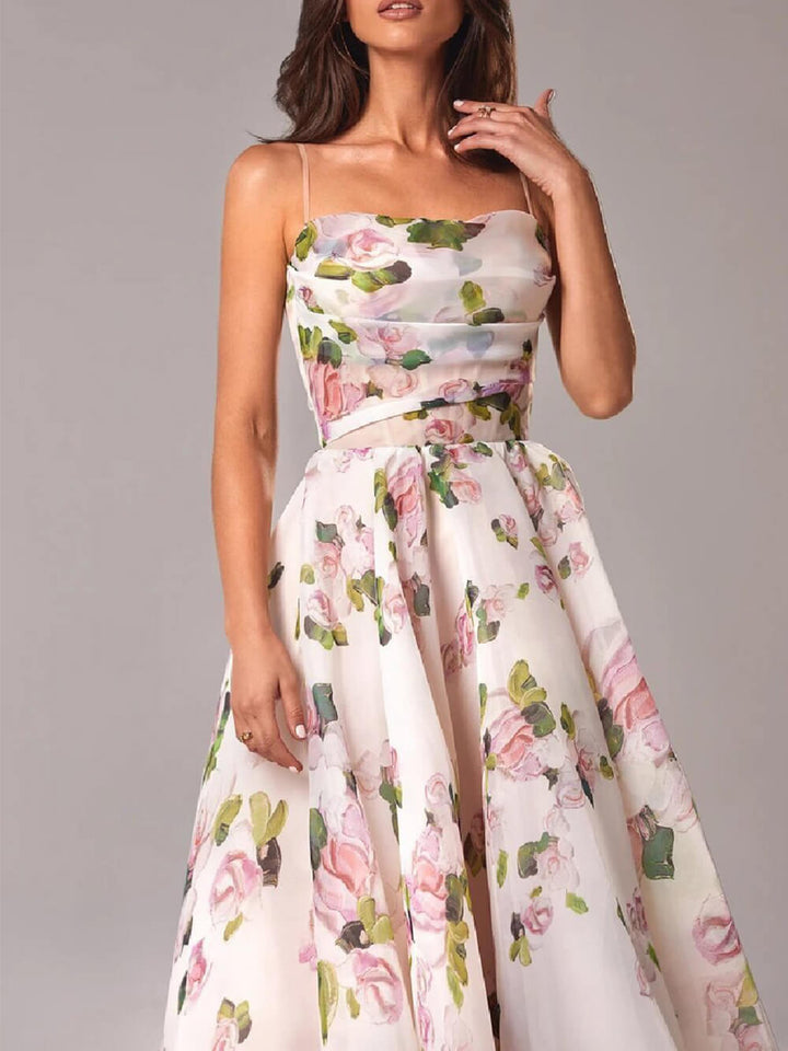 Sleeveless women's elegant boho midi dress, a-line flowy summer style with slender spaghetti straps.