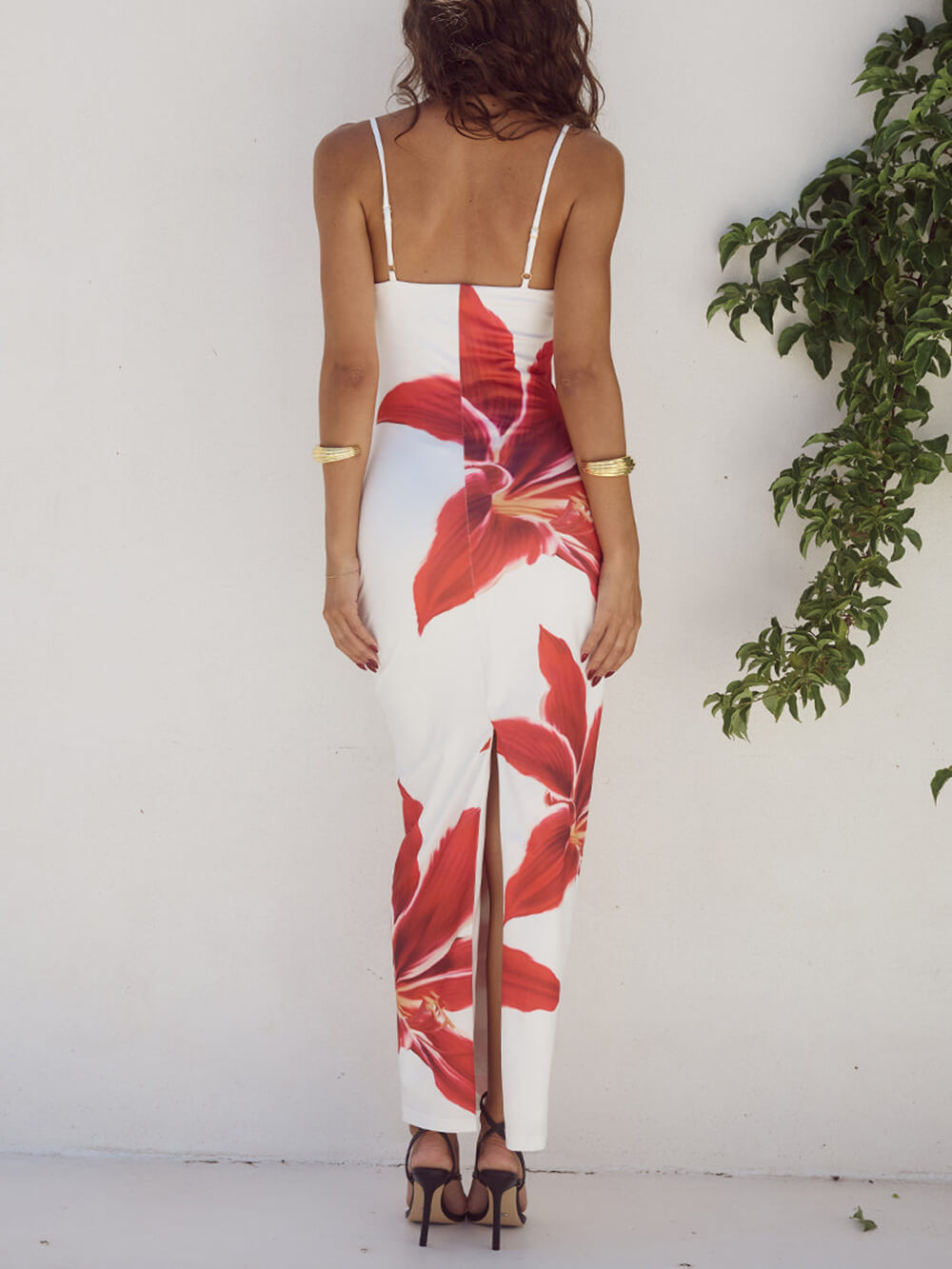 Elegant women's floral maxi beach dress, featuring a vibrant abstract print and a flowy summer design.