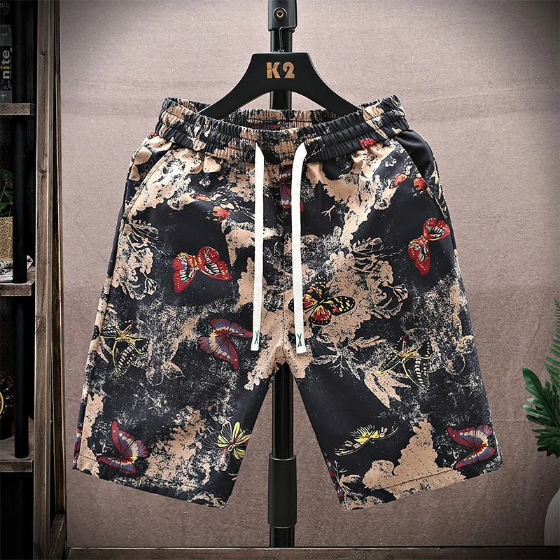 Men's relaxed fit patterned shorts with drawstring waist, ideal for casual summer wear.