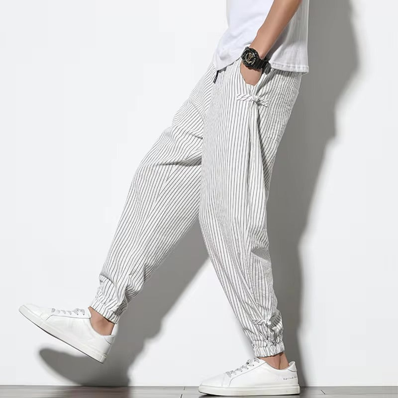 Kaizen men's striped joggers. Comfortable, stylish, and relaxed fit drawstring pants for casual wear.