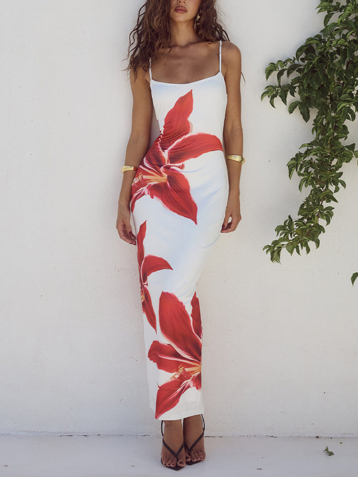 Women's floral maxi beach dress with elegant abstract print, perfect for summer vacation.