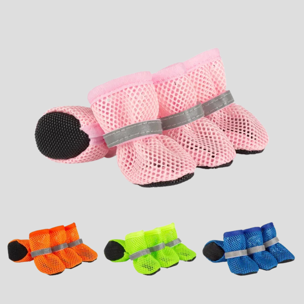 Anti-slip dog & cat paw protectors. Comfortable pet shoes for indoor & outdoor use, ensuring safety & paw health.