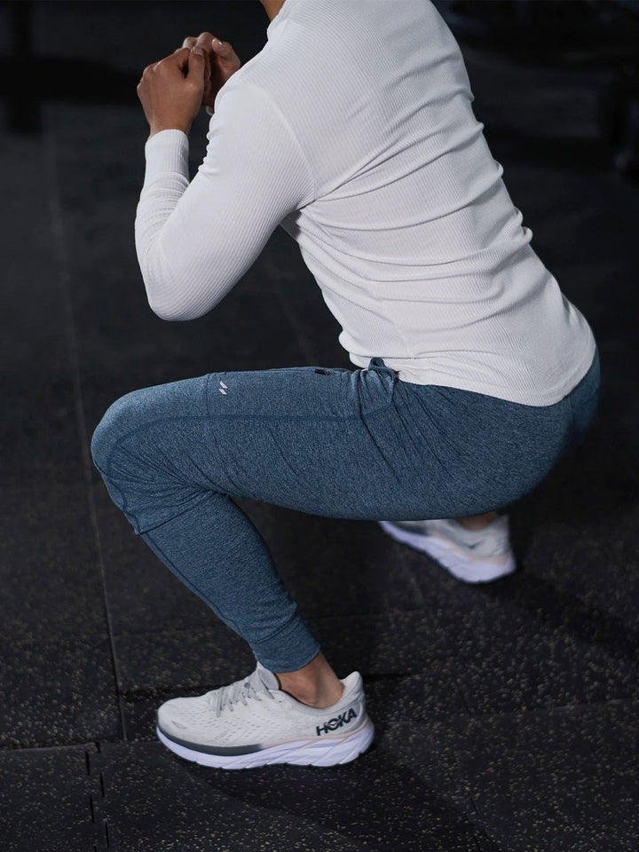 Everyday men's stretch joggers; casual athletic bottoms with flexible performance.