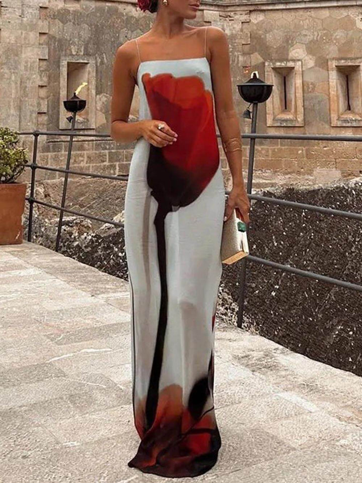 Women's flowy blue abstract print maxi sundress, perfect for summer casual wear and beach vacations.