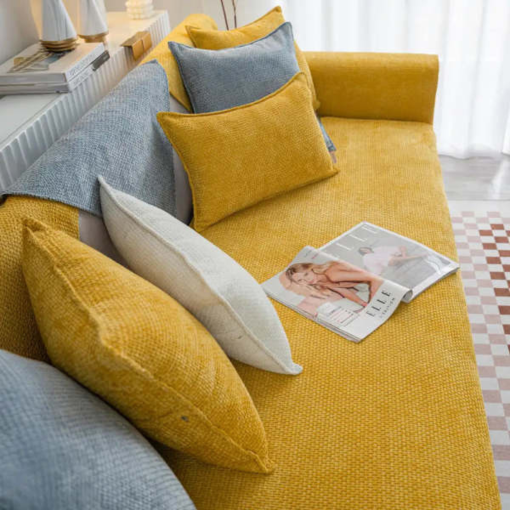 Luxurious velvet non-slip sofa cover protecting living room furniture from pet damage. Modern home decor couch cover.