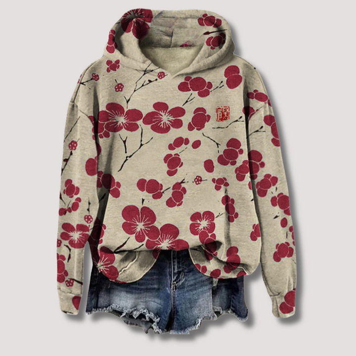 Casual women's long-sleeve floral print hooded sweater. Stylish and comfortable layering piece for spring and summer fashion.