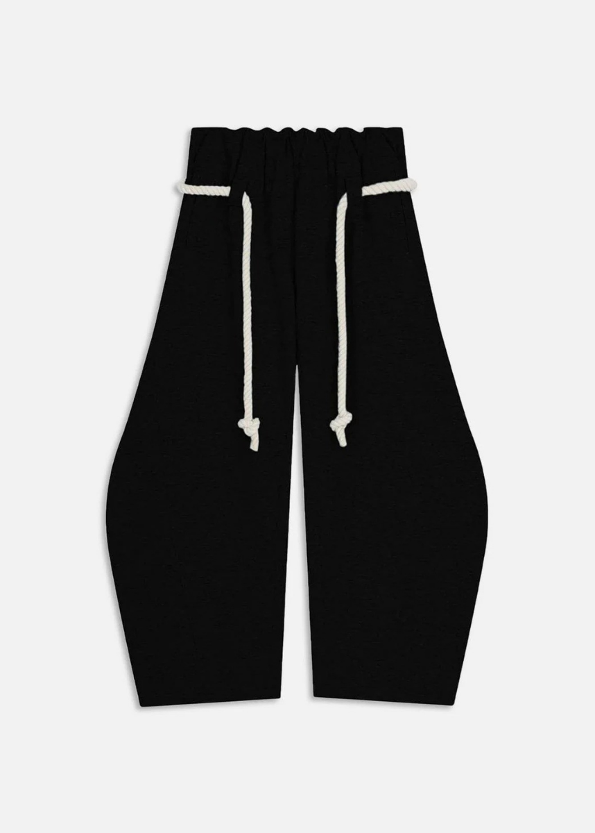 Stylish women's barrel leg loungewear. High waist, loose fit, perfect for casual trousers or streetwear fashion.