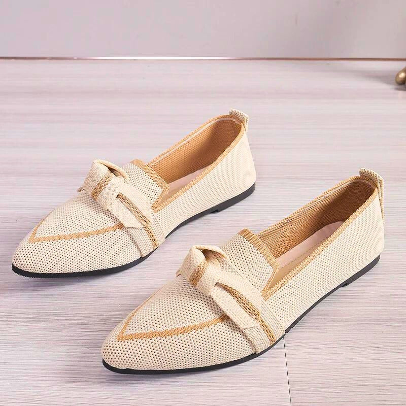 Women's comfortable ballet flats with arch support, perfect for everyday wear.