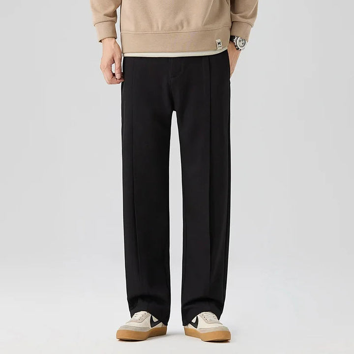 Khaki men's pleated drape trousers with a relaxed fit, perfect for comfortable, stylish wear.