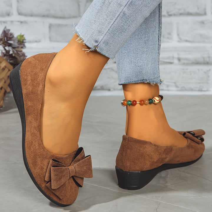 Comfort-focused women's flats with excellent arch support.