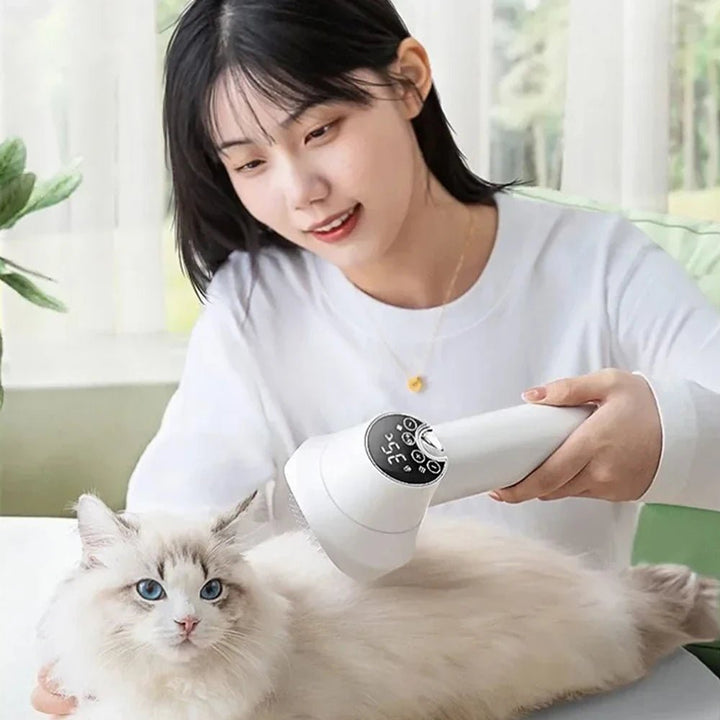Pet grooming comb with built-in hair dryer, ideal for pet hair care and styling
