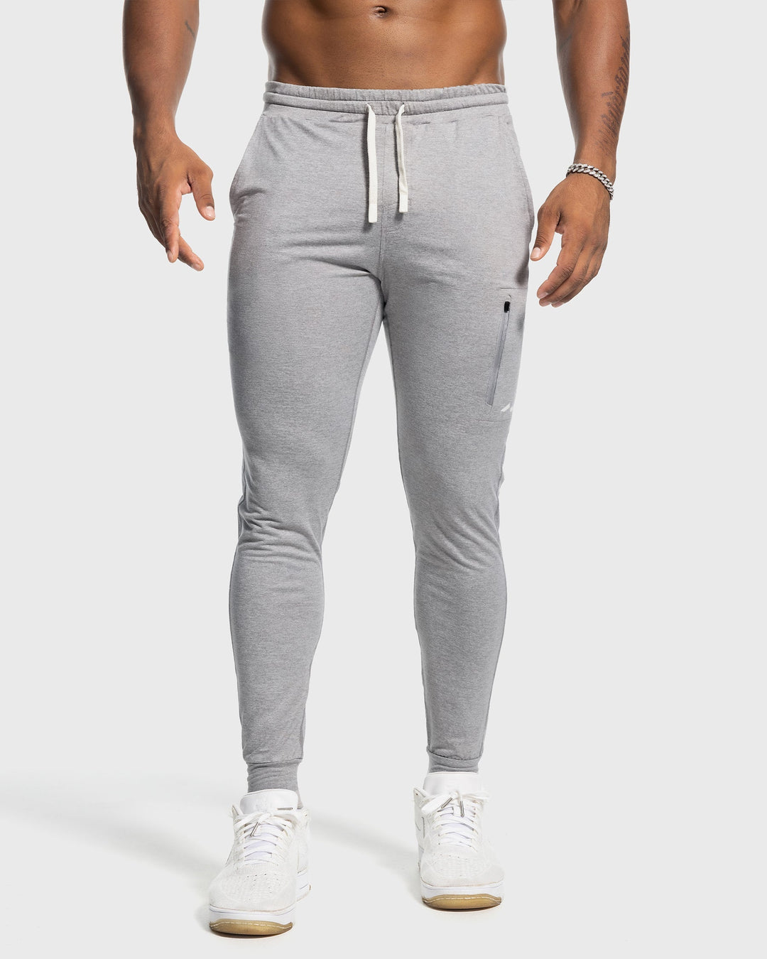 Flexible men's athletic stretch joggers; ultimate comfort bottoms for active life.