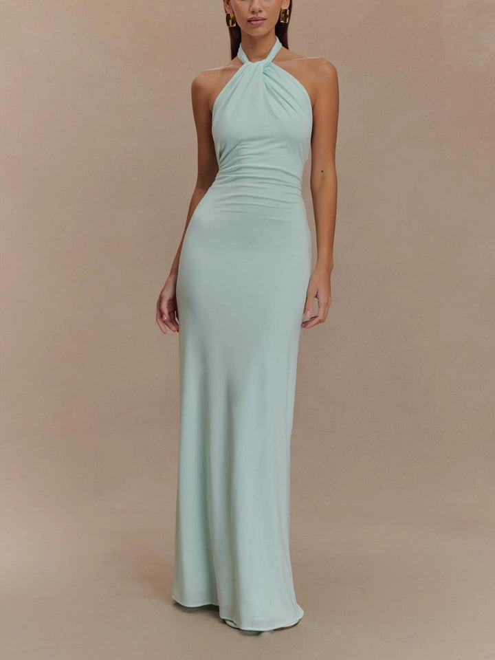 Elegant women's halter maxi sundress with open back, perfect for summer, beach, or vacation.