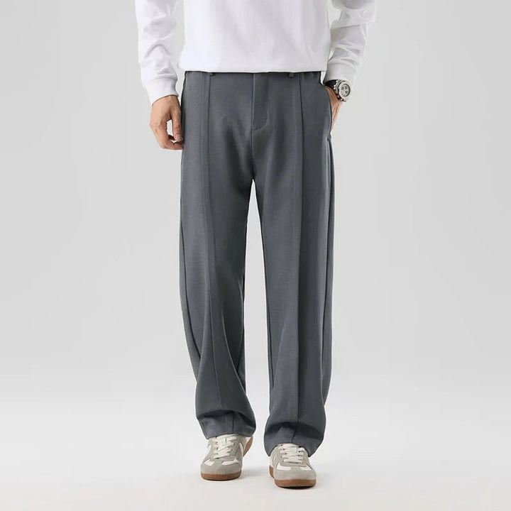 Black men's pleated drape trousers, a sophisticated choice for formal or casual men's fashion.