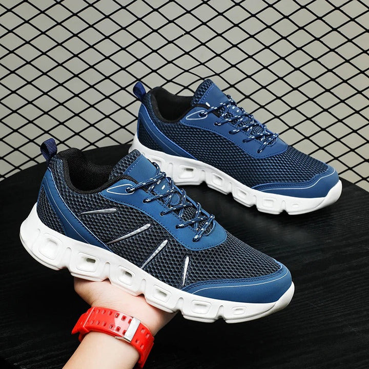 Lightweight blue unisex sneakers with advanced support, designed for ultimate comfort during runs and active training.