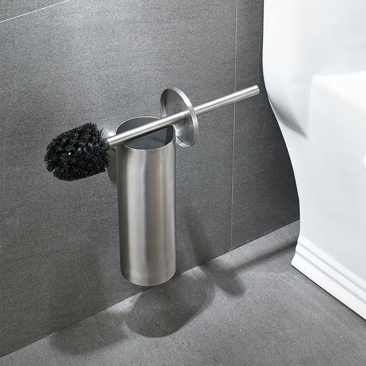 Stylish wall-mounted toilet brush with durable stainless steel handle for effective bathroom cleaning & hygiene.