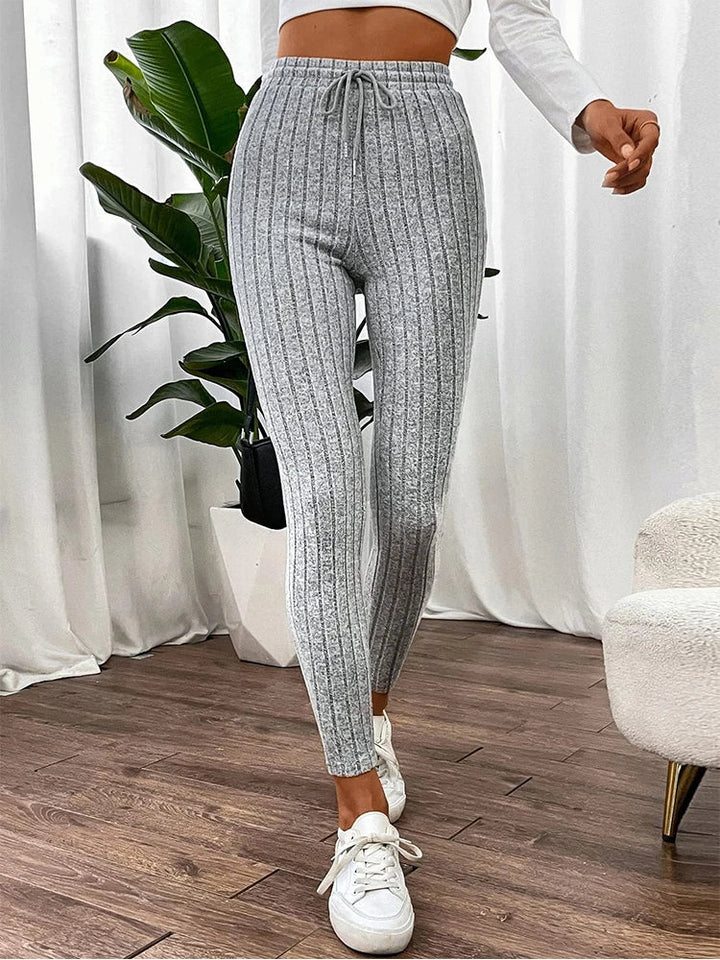 Comfortable women's high-rise ribbed leggings, great for athleisure, light activewear, or stylish casual outings.
