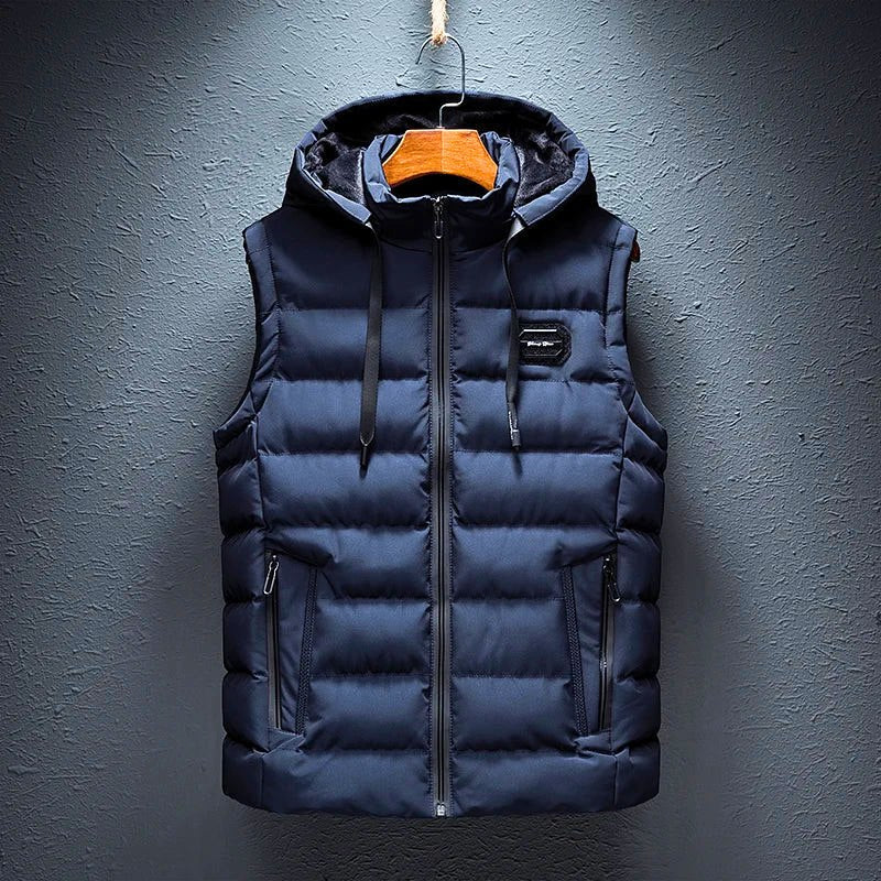 Warm men's hooded puffer vest, great for layering. Versatile casual outerwear with convenient zippered pockets & comfort.