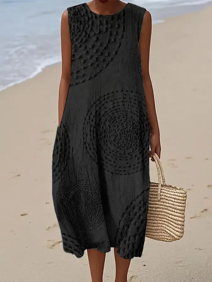 Feminine A-line embroidered midi party dress for women, sleeveless and comfortable, ideal for summer events.