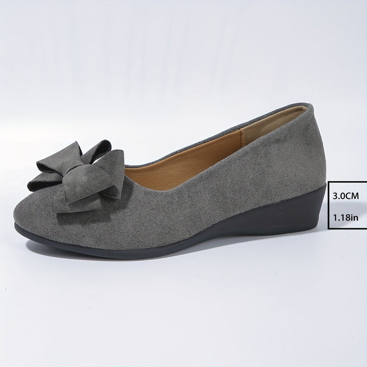 Stylish women's flats with bow detail, perfect for elegant daily wear.