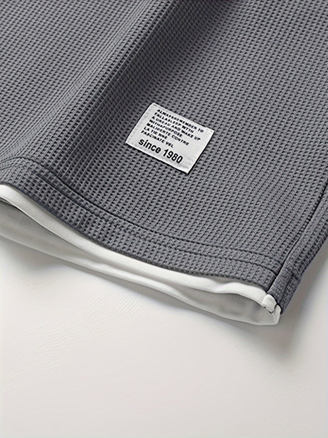 Soft men's waffle texture lounge wear. Relaxed fit two-piece set with shorts & t-shirt for daily comfort.