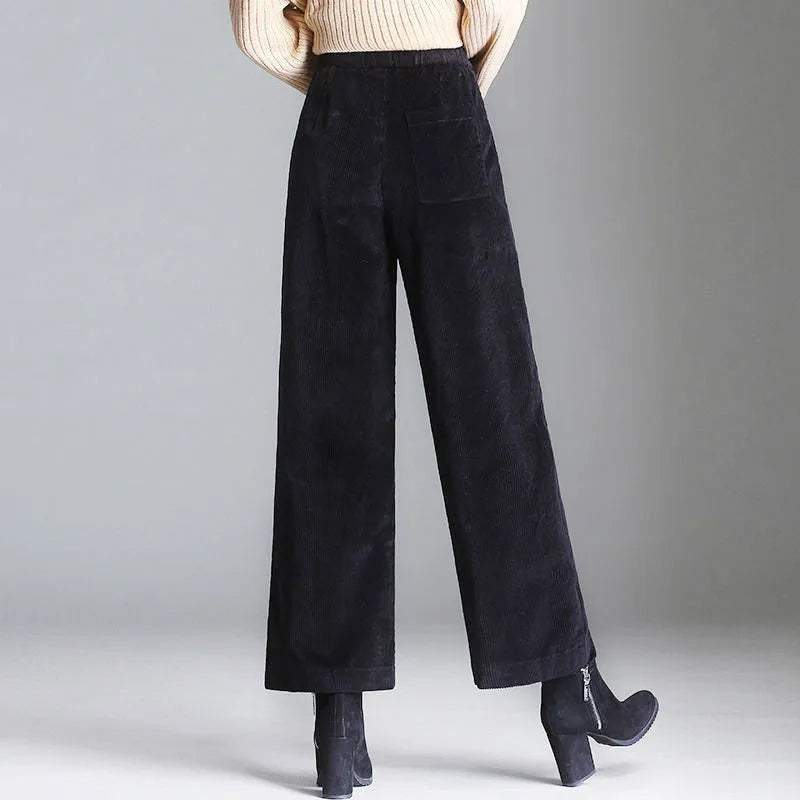 Women's comfortable high-waisted flare pants in retro style, featuring patch pockets and available in multiple colors.
