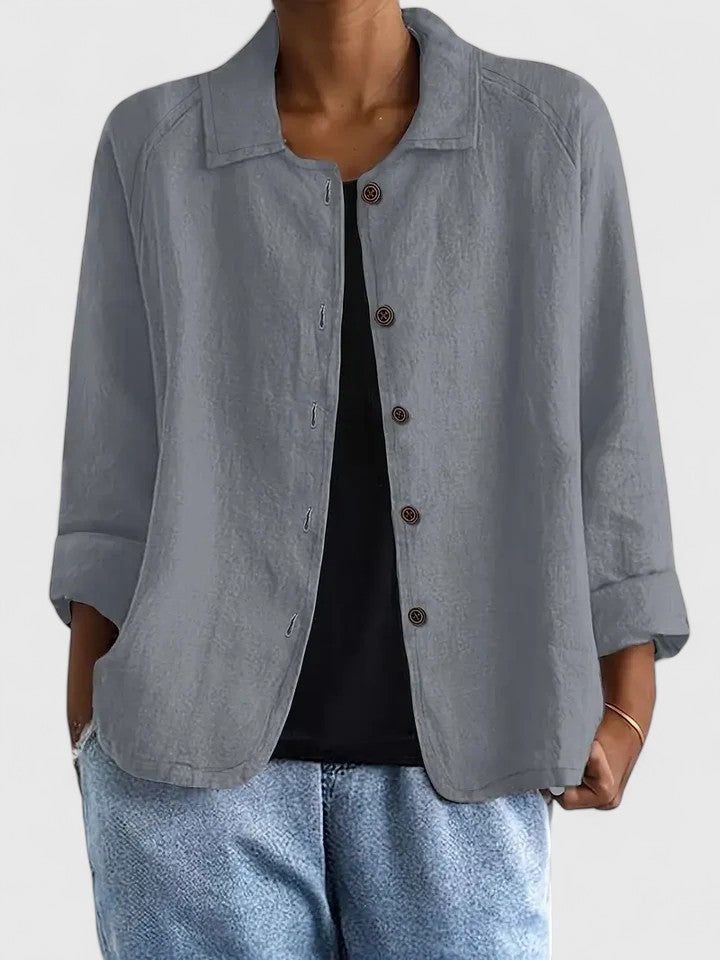 Stylish women's loose-fit top, perfect for layering. Comfortable everyday chic, suitable for any season.