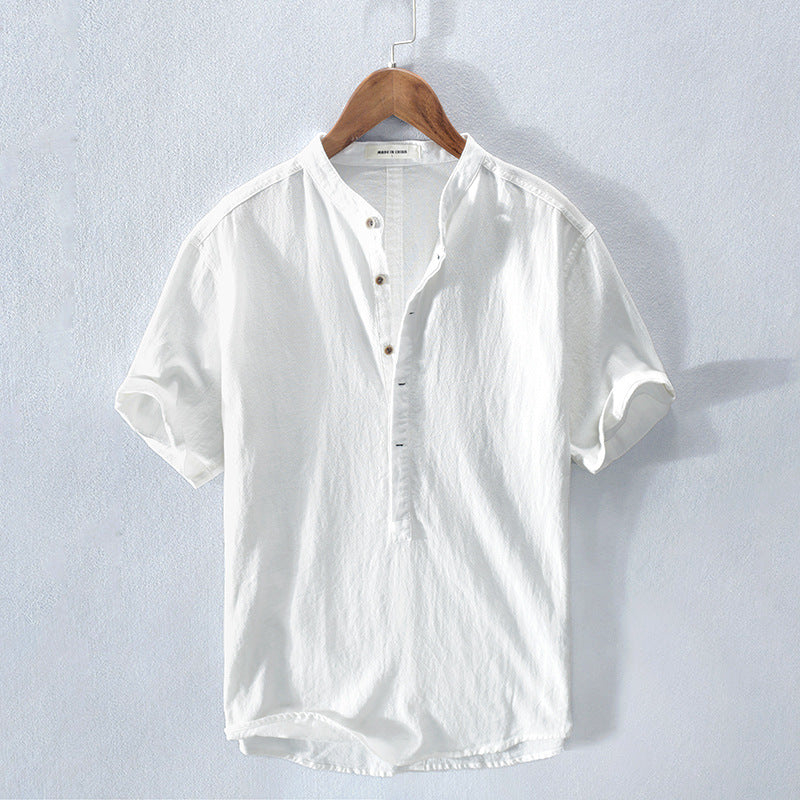 Men's relaxed fit short sleeve Henley top in soft fabric, perfect for casual summer wear and everyday comfort.