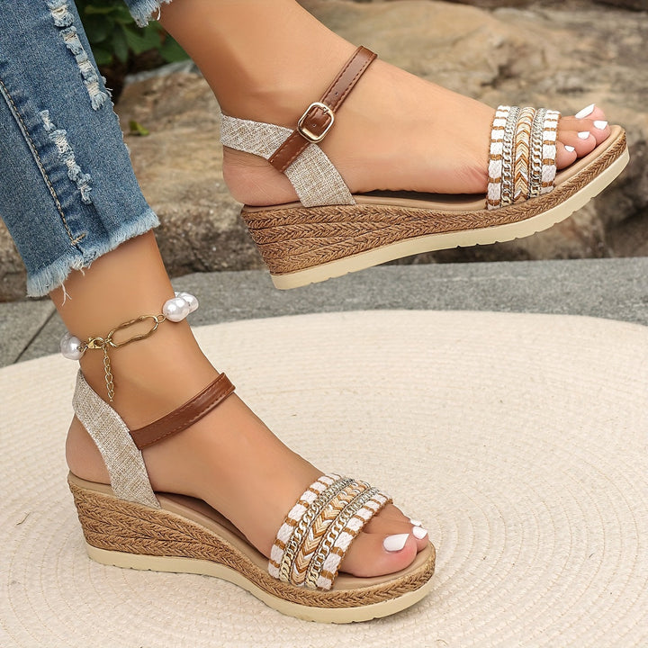Fashionable women's wedge sandals featuring a platform design, cross strap & stable heel. Perfect for summer.