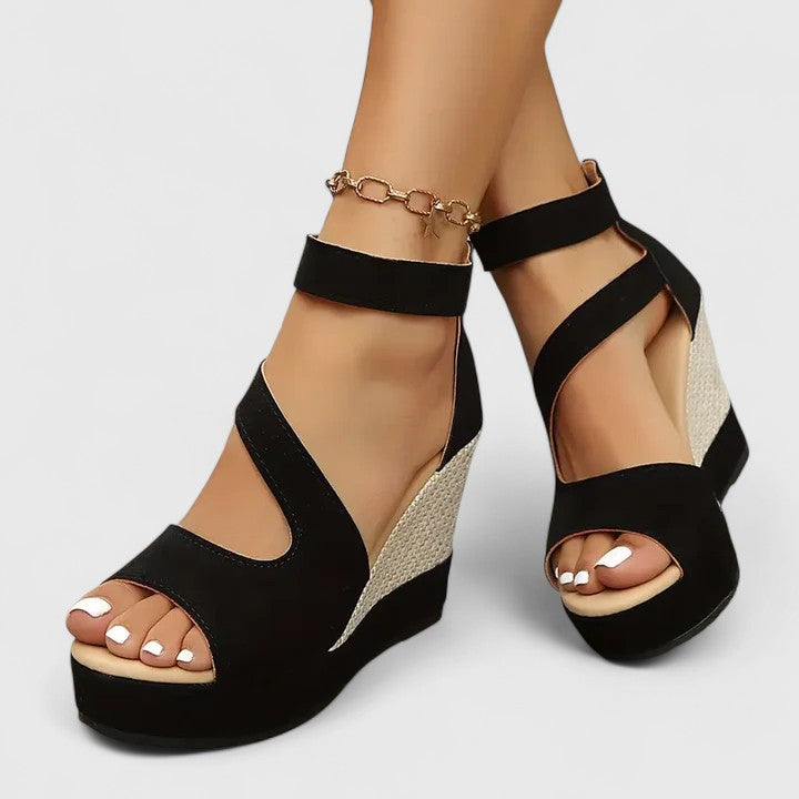 Front view of women's orthopedic wedge sandals, combining elastic strap comfort, stylish woven heel & arch support.