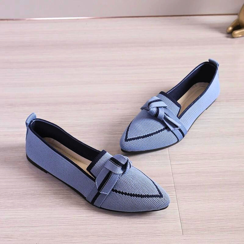 Elegant blue women's ballet flats, offering superior arch support for versatile casual wear.