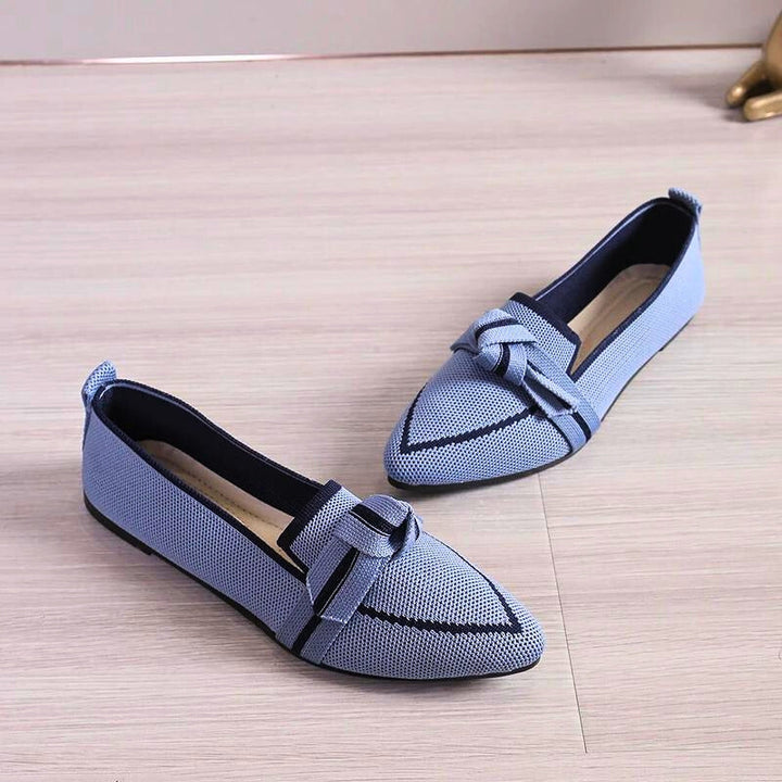 Elegant blue women's ballet flats, offering superior arch support for versatile casual wear.