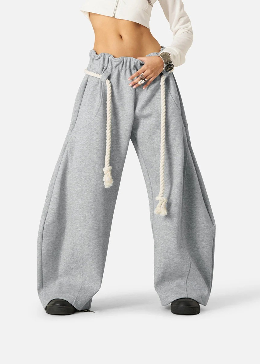 High waist barrel leg women's sweatpants, featuring a comfortable elastic waist and modern baggy fit.