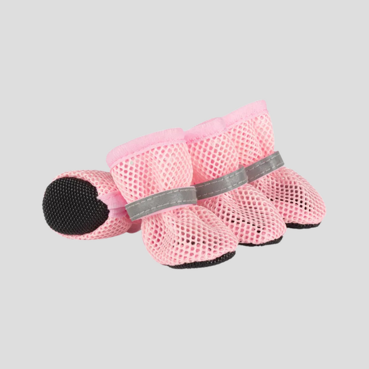 Durable anti-slip dog & cat shoes for superior paw protection. Secure pet boots provide traction & comfort on any surface.