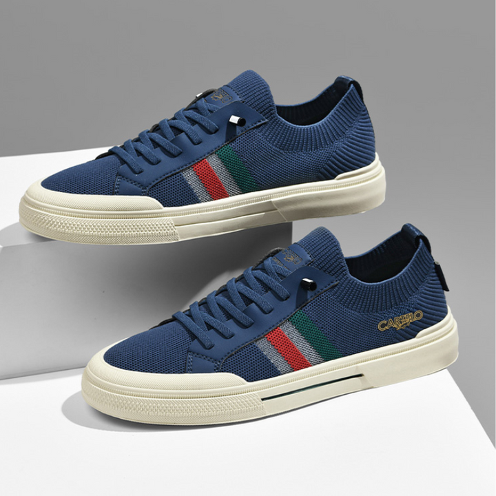 Side view of men's athletic lace-up sneakers, offering lightweight comfort for street style.
